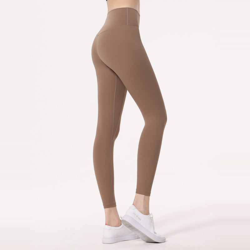 Legging femme taille haute et extensible pour sport et yoga