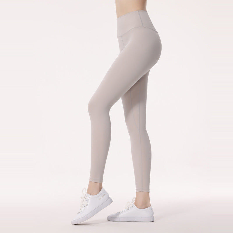 Legging femme taille haute et extensible pour sport et yoga