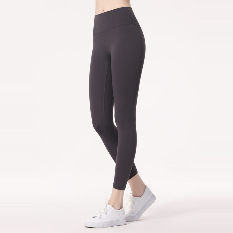Legging femme taille haute et extensible pour sport et yoga