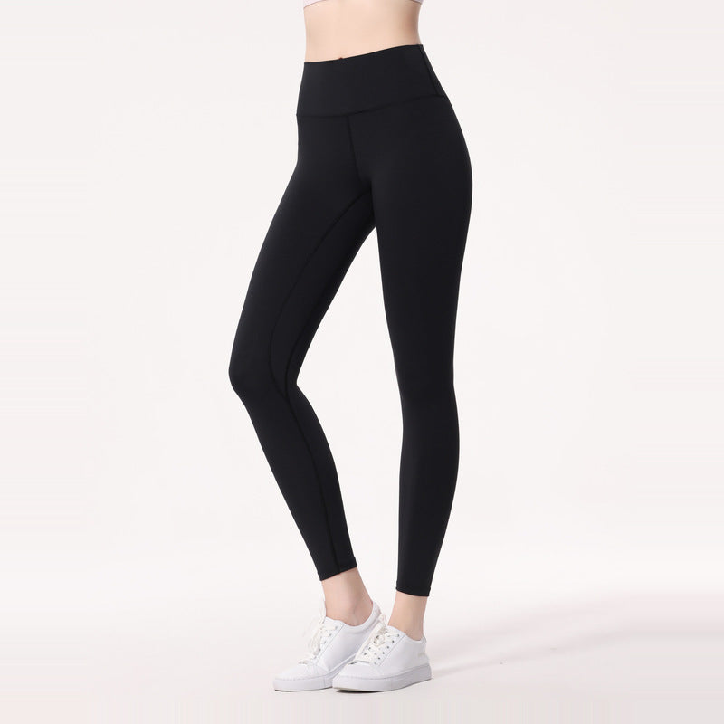 Legging femme taille haute et extensible pour sport et yoga